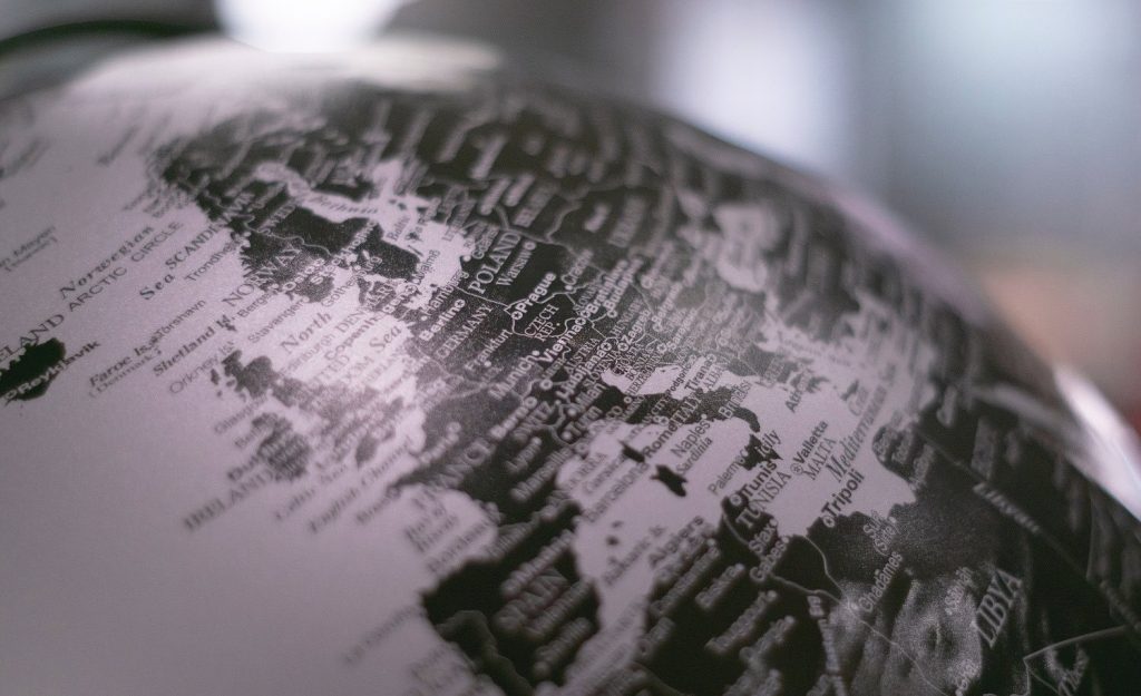 A black and white photo of a globe